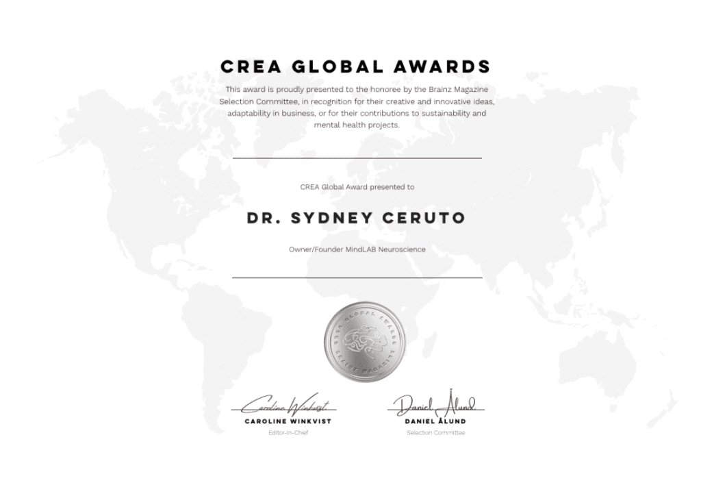 Life Coaching Service Dr. Sydney ceruto receiving an award at the brainz crea global awards for her excellence in neuroscience-based executive development coaching.
