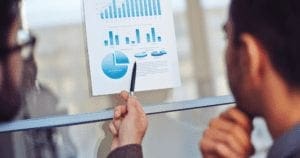 Two people going over reports
