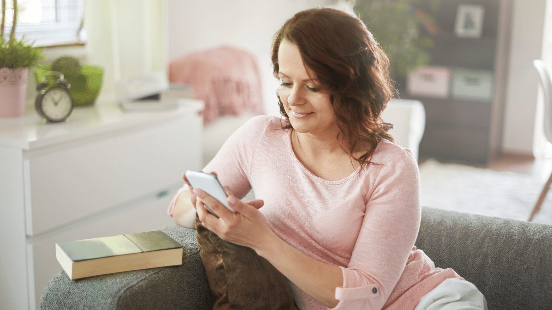 Woman sitting on couch