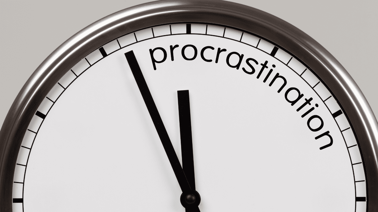 Clock pointing to 'procrastination', symbolizing overcoming procrastination through life coaching for achieving goals and behavior change. Neuroscience of Procrastination