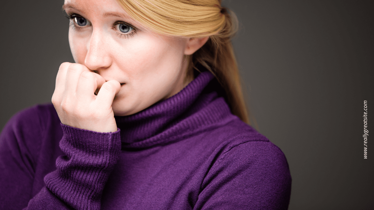 Life Coaching process, Woman biting nails, depicting communication anxiety and need for life coaching, self-improvement strategies for addressing fear and self-doubt in social interaction, life coaching process