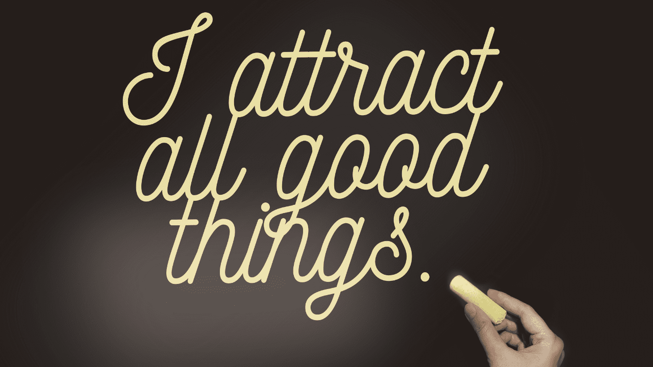 Blackboard with the words 'I Attract All Things Good', symbolizing the law of attraction and manifestation and thinking positive.