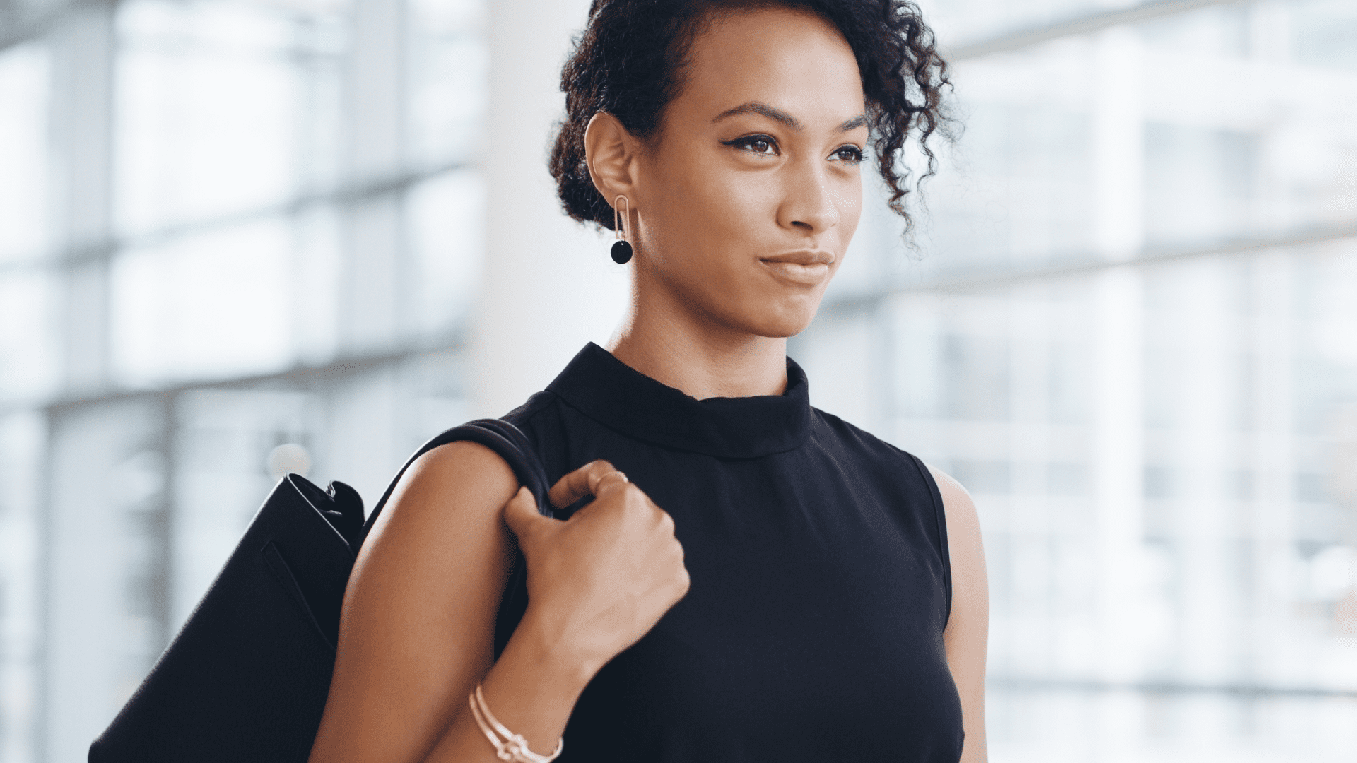 Woman being confident as she walks through the office