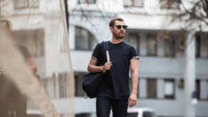 Man being confident as he strides down the street