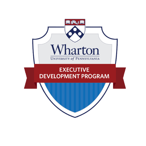 Dr. Sydney Ceruto receiving an award at Wharton School of Business for her contributions to Neuroscience-Based Executive Development Coaching.