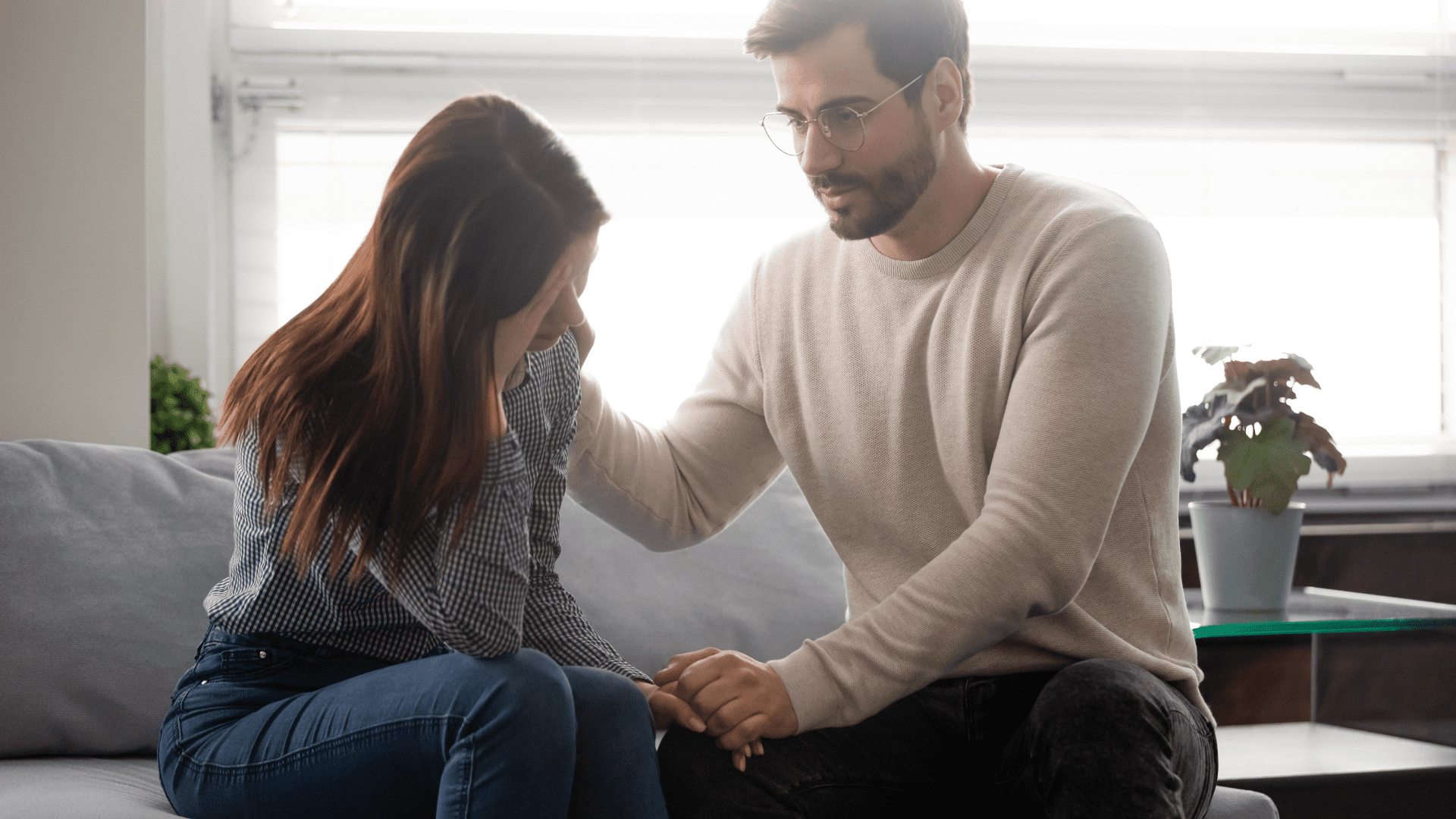 Man using empathetic-brain-rewiring techniques to reassure his wife.