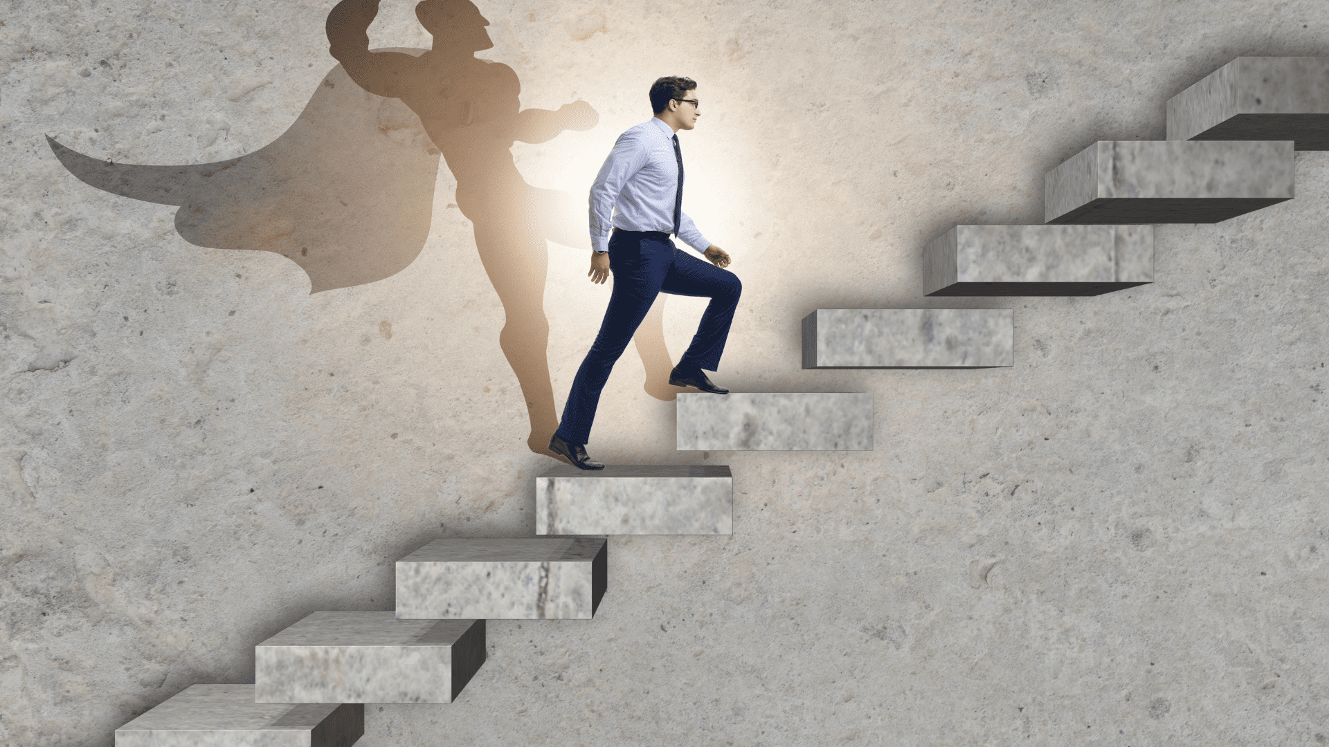 a man walking up stairs with a superhero shadow indicating a sense of accomplishment from deep work habits