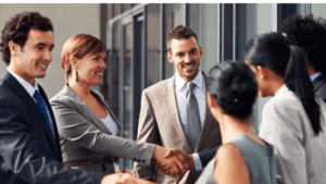 Neuroscience Updates 37 a group of professional men and women shaking hands The neuroscience of relationships: Exploring how our brains shape and are shaped by our social connections. #NeuroscienceOf Relationships