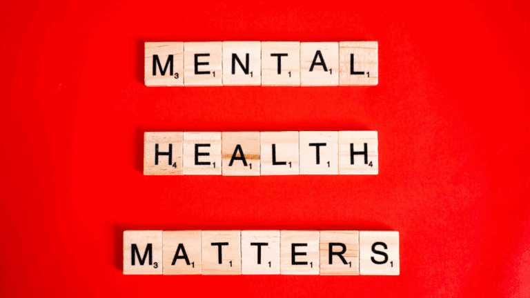 a group of wooden letters on a red background