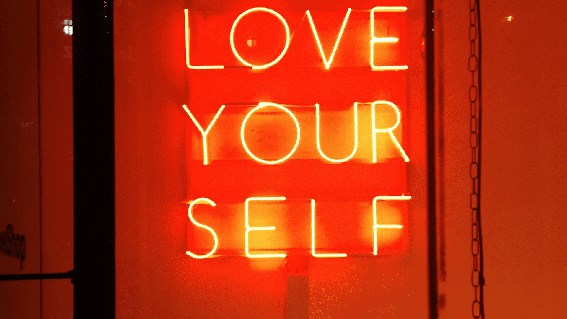 a neon sign with words