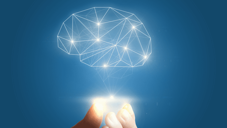 a person's fingers touching a brain meant to reference theory of mind