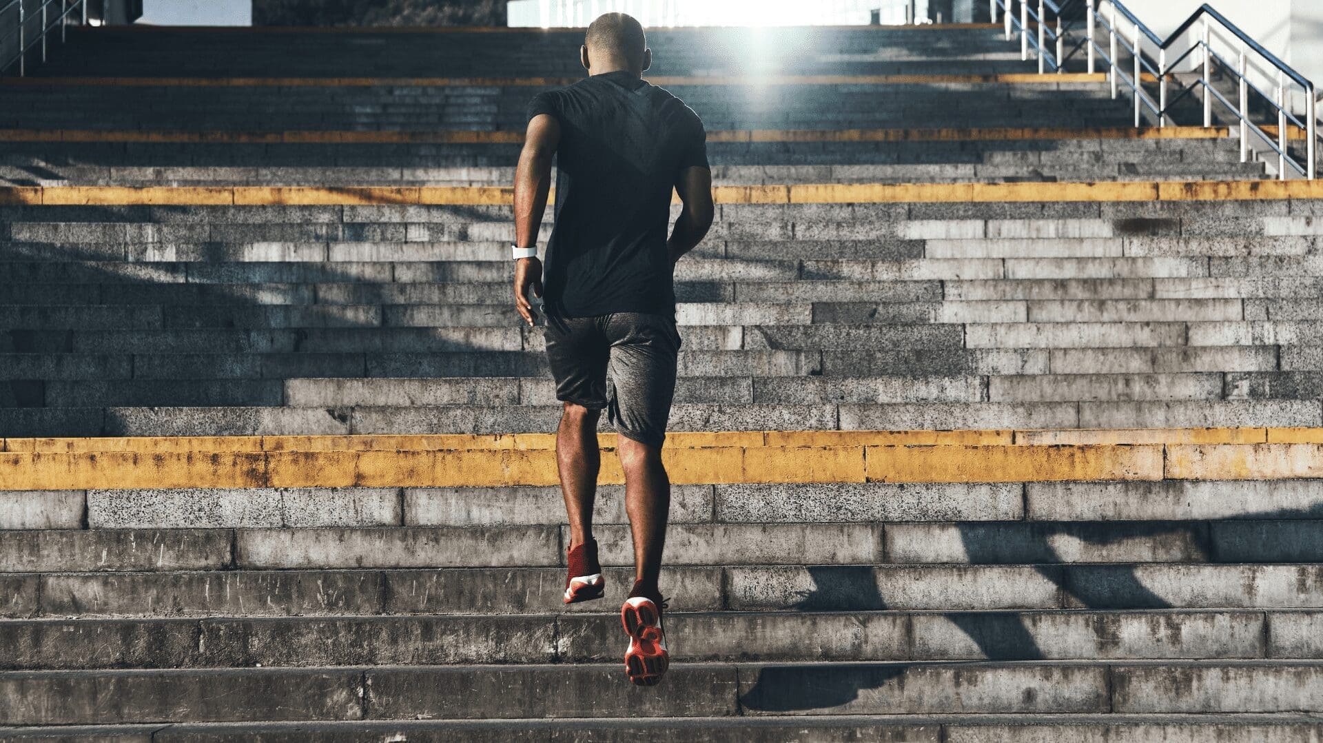 a man running up stairs trying to form a habit