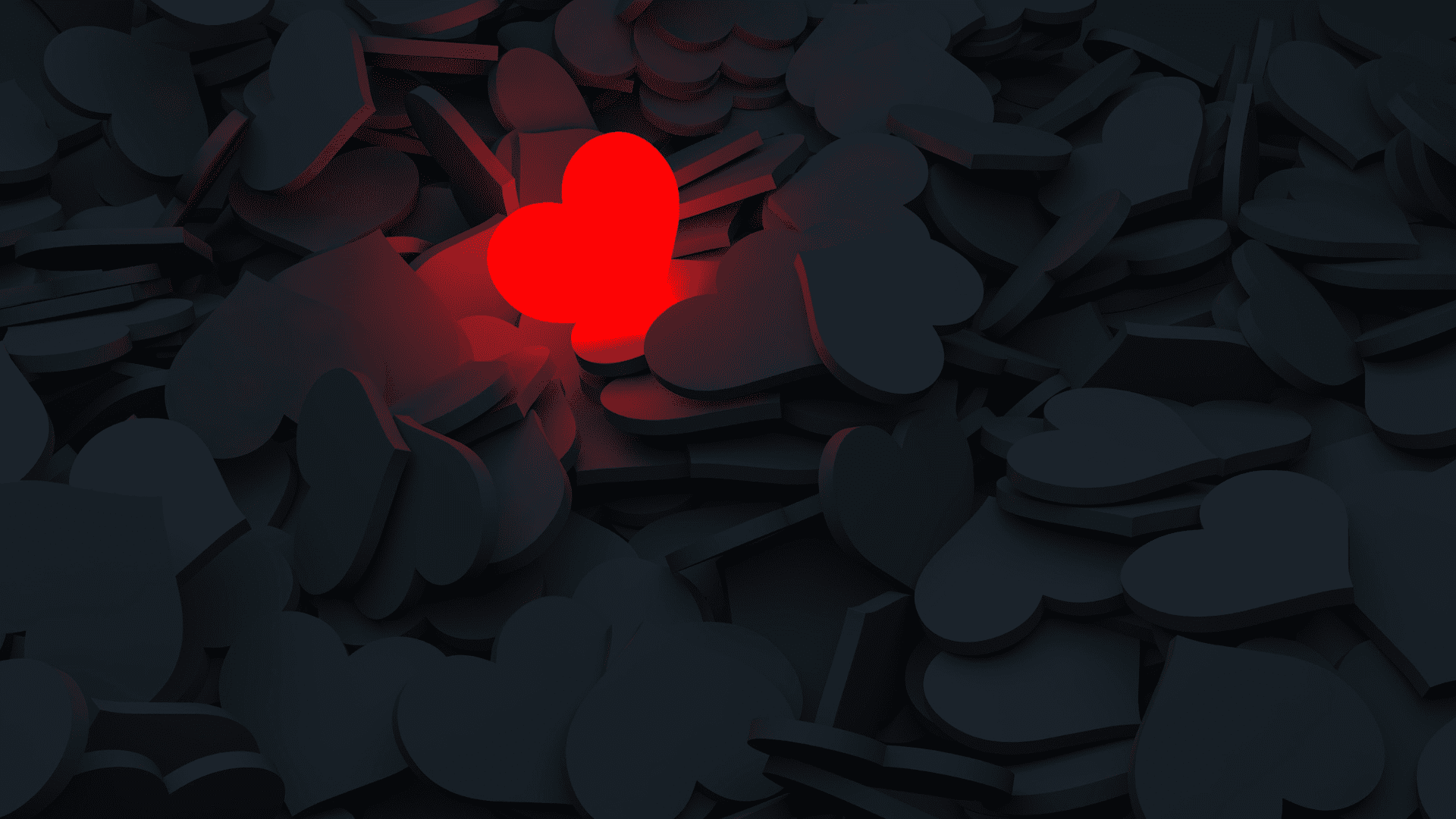 a lonely red heart surrounded by black hearts