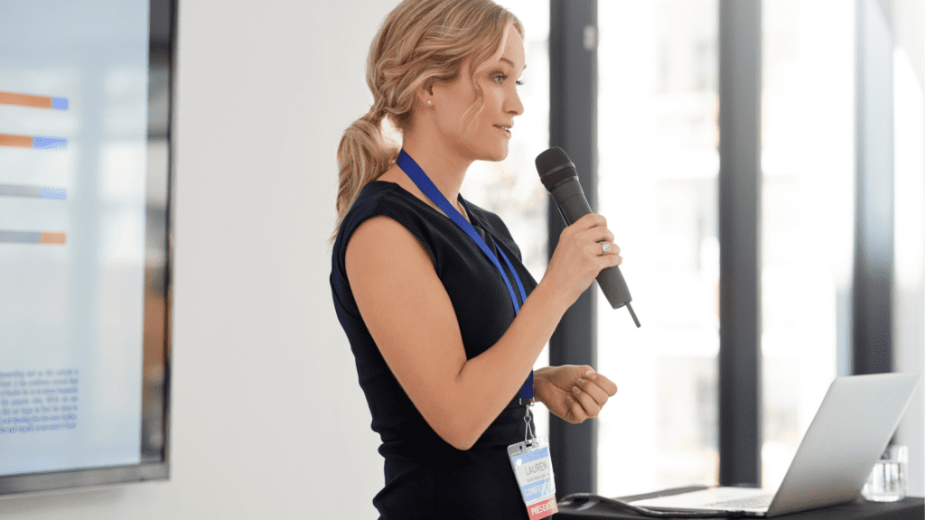 a woman holding a microphone