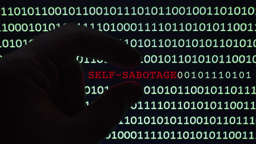 The Neuroscience of Self-Sabotage: Why We Are Our Own Worst Enemy 1 A computer screen with lines of numbers and then the word self-sabotage in red.