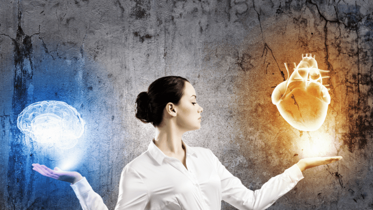 Woman balancing glowing brain and heart illustrations representing emotional unavailability. A professional woman in a white shirt stands against a textured wall, balancing a glowing blue brain on one hand and a glowing golden heart on the other, symbolizing the balance between logical thinking and emotional intelligence.