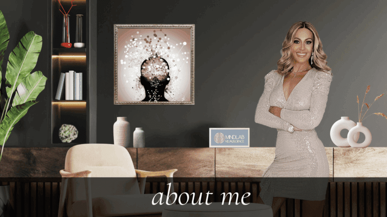 About Me: Dr. Sydney Ceruto, leading neuroscience coach, standing in her MindLAB Neuroscience office representing expertise in cognitive and behavioral transformation