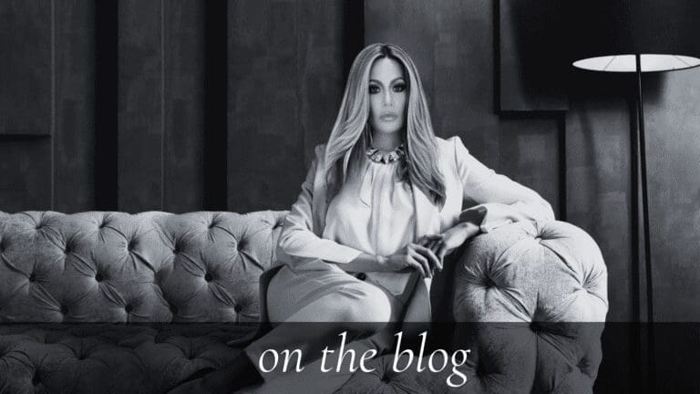 On The Blog: Dr. Sydney Ceruto, founder of MindLAB Neuroscience, seated thoughtfully in a modern office, sharing science-based insights and coaching expertise