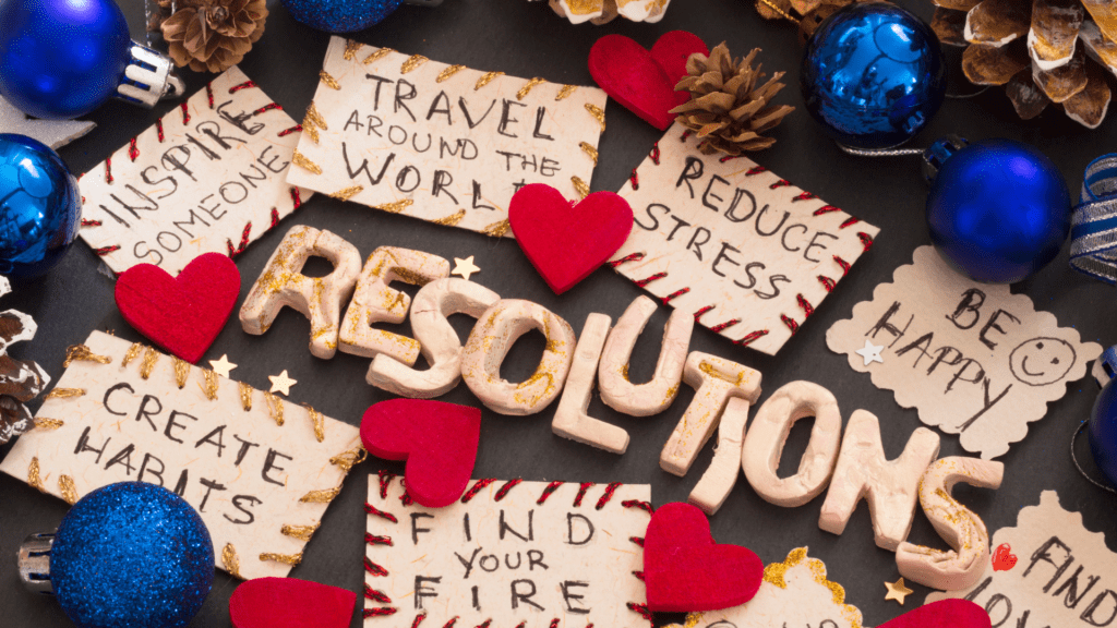 New Year's Resolutions with Holiday Decorations

Alt Text: A collage of holiday-themed New Year's resolutions with handwritten goals surrounded by hearts, ornaments, and pinecones.


