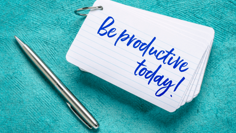 Handwritten note saying Be productive today with pen on turquoise background.