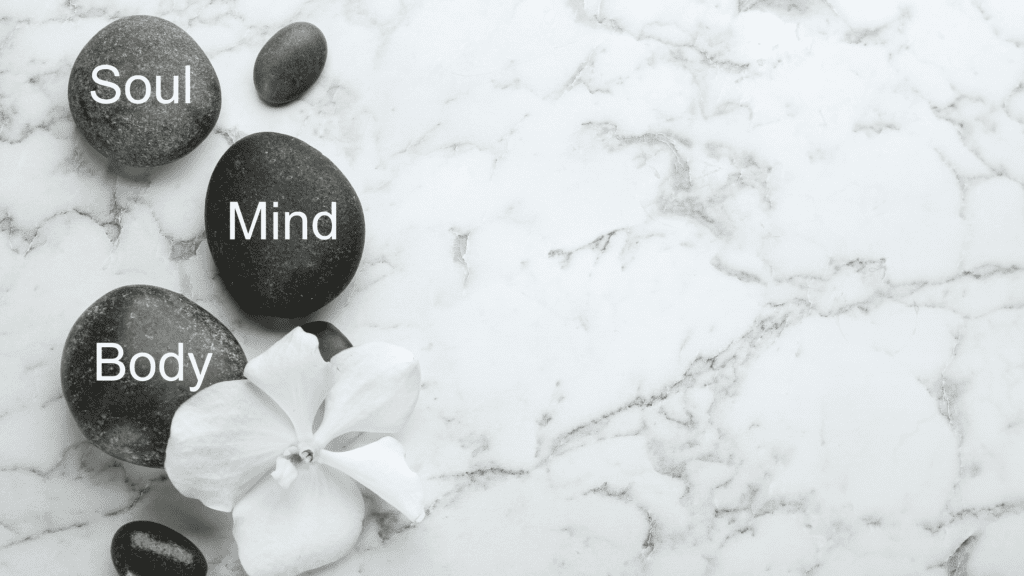 Mind body soul balance concept with zen stones and orchid.
