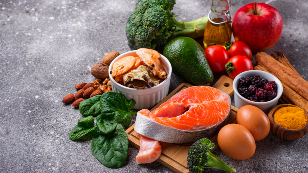 A variety of nutrient-rich foods including salmon, nuts, berries, and vegetables, known to support brain health.