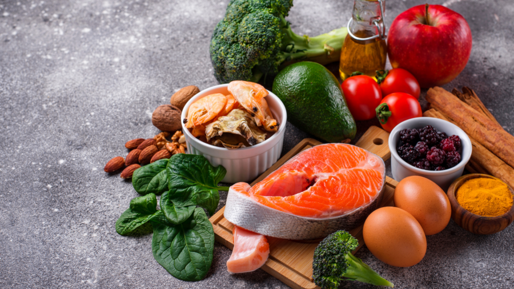  A variety of nutrient-rich foods including salmon, nuts, berries, and vegetables, known to support brain health.

