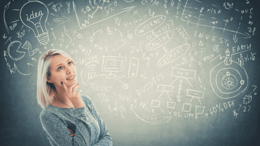 A thoughtful young woman visualizing creative professional development ideas with innovative business concepts sketched on a chalkboard. Meta description: Discover professional development ideas that leverage neuroscience to boost cognitive flexibility, enhance decision-making, and drive career success.