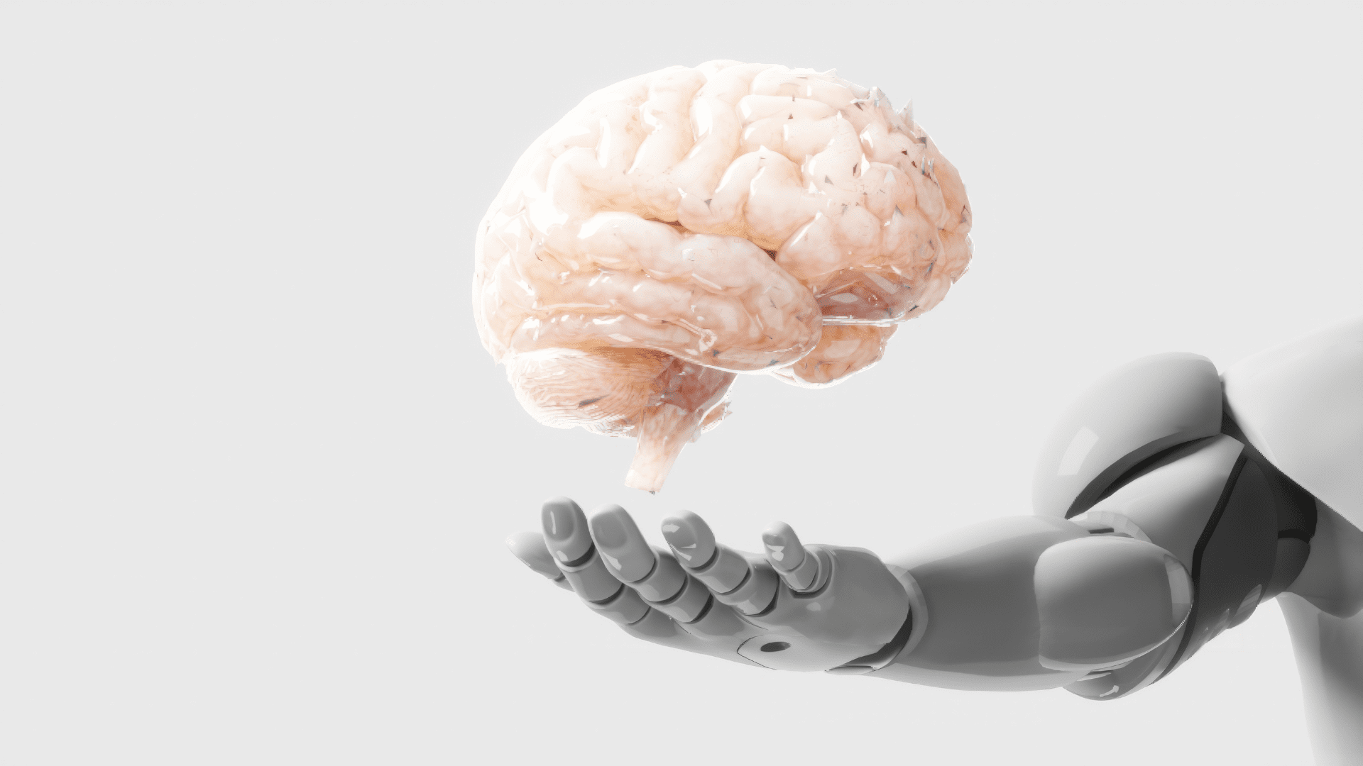 A robotic hand holding a human brain, illustrating the intersection of artificial intelligence and neuroscience in cognitive enhancement.