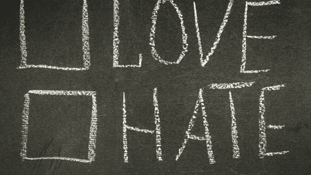 Chalkboard with the words "Love" and "Hate" written in chalk, symbolizing the emotional extremes often experienced in Borderline Personality Disorder.


