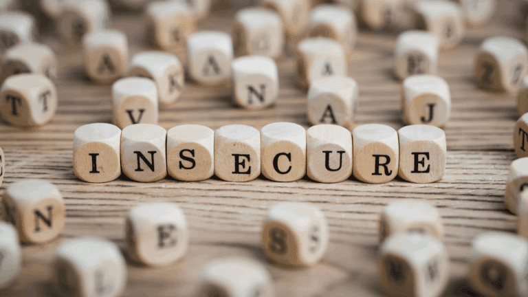On the Blog 2 Wooden blocks spelling insecure, representing the neuroscience of insecurity