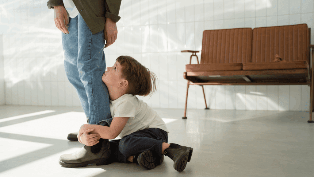 Child clinging to parent’s leg, illustrating attachment and the neuroscience of insecurity






