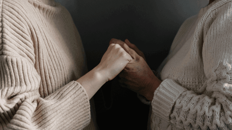 On the Blog 3 Two people holding hands for emotional support during reassurance-seeking