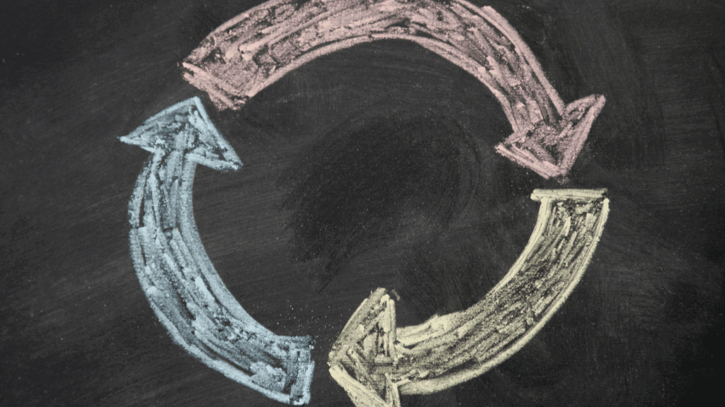 Chalk-drawn circular arrows illustrating the habit loop of reassurance-seeking




