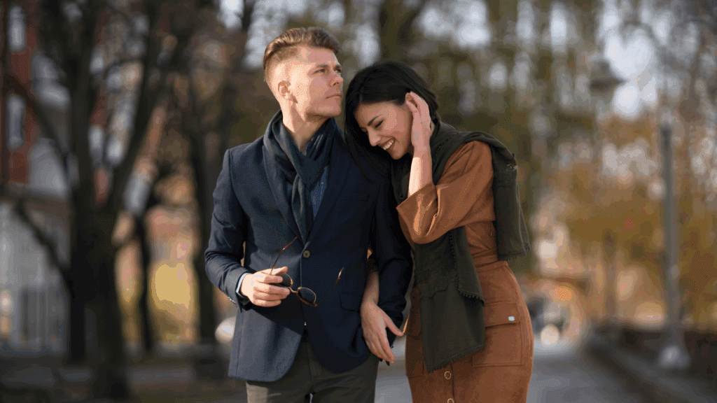 A couple walking arm in arm, highlighting the challenges of hyper independence in relationships.