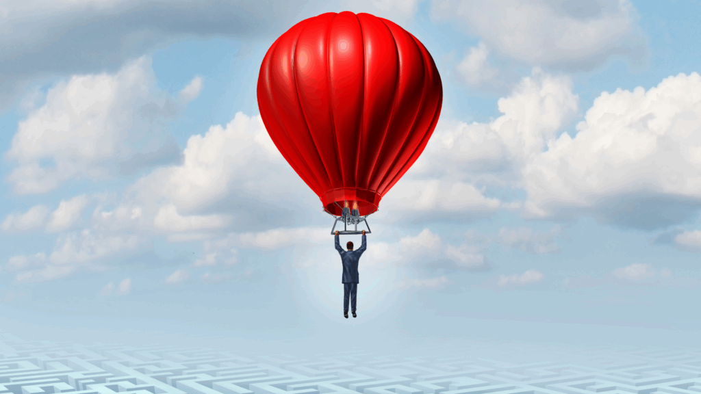 Person rising in a red hot air balloon, representing the uplift of taking the high road