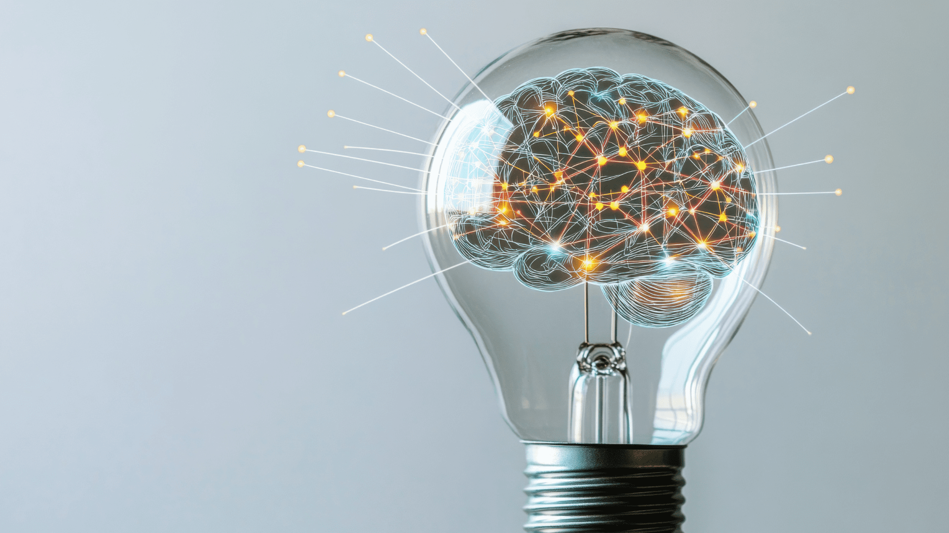 Brain illustration glowing inside a lightbulb, symbolizing innovation and Brain-Based Learning strategies.