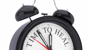 The Science of Calm: How to Stop a Panic Attack with Your Brain’s Help 2 Close-up of a clock reading time to heal, symbolizing recovery and strategies for how do I stop a panic attack effectively.