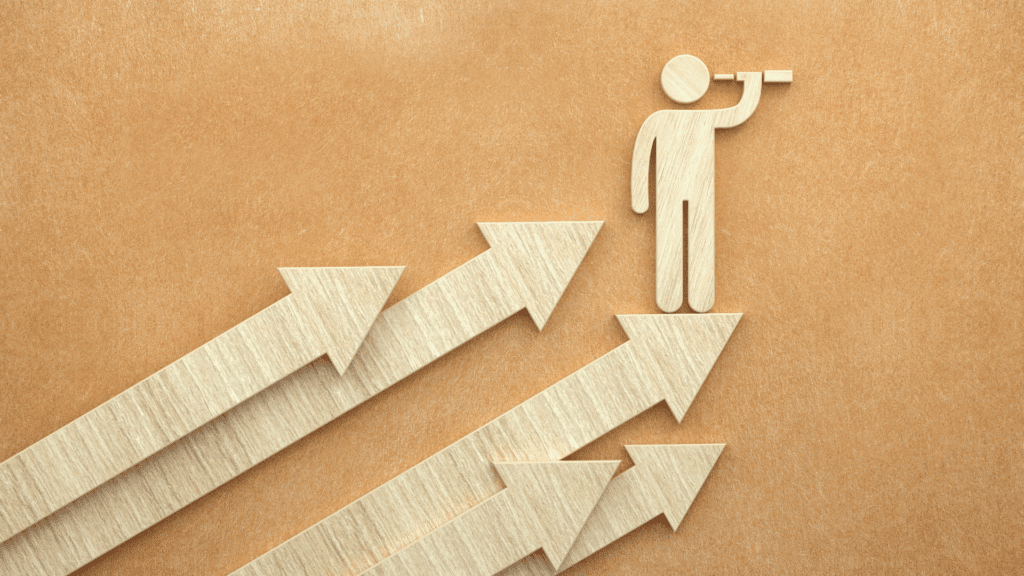 Wooden figure with a telescope standing on arrows, symbolizing leadership presence and vision for future growth.