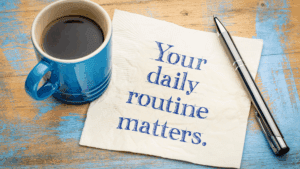 Dopamine-Aware Leadership: Neuroscience for Motivating Teams 2 “Coffee cup and note reading your daily routine matters, symbolizing habit formation in Dopamine-Aware Leadership.”