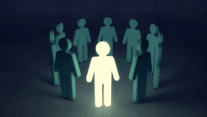 The Neuroscience of Adaptive Leadership 2 “Glowing figure standing among others, symbolizing confident decision-making in the Neuroscience of Adaptive Leadership.”