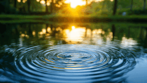 Ripple effect on calm water at sunrise, symbolizing reflection and the influence of strong thinking dispositions.