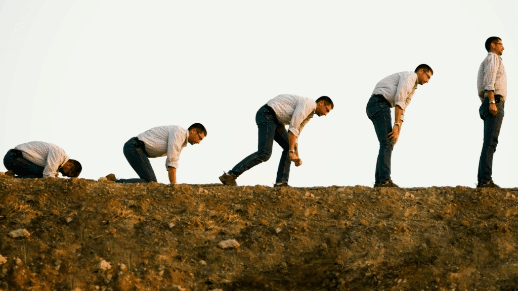 Photo sequence of a person standing up, depicting the evolutionary journey towards a neuroscience-based approach to emotional stability, including dopamine and mood swings.