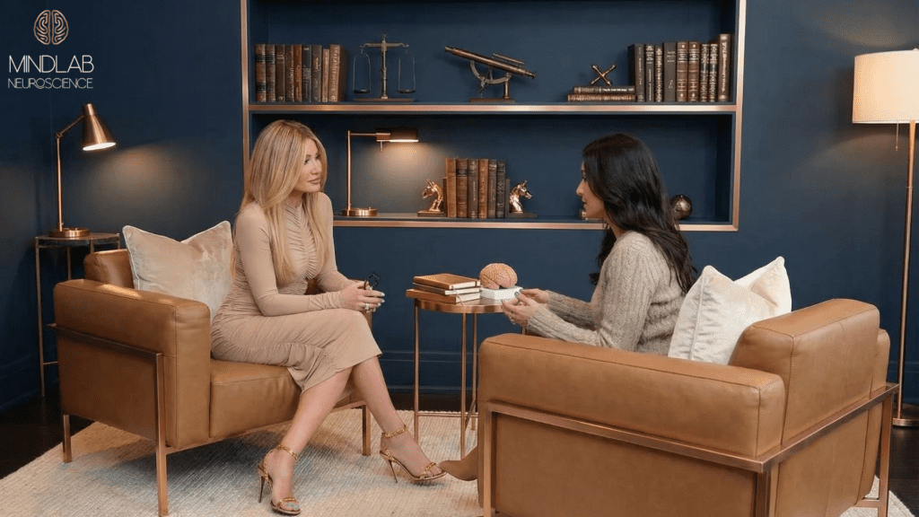 Brain Optimization: Rewiring PTSD, Depression, Anxiety, ADHD 8 Dr. Sydney Ceruto coaching a client on brain optimization in her MindLAB Neuroscience office.