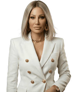 Dr. Sydney Ceruto, Neuroscientist & Author, in a white suit with gold buttons